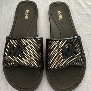 Black/Gold Michael Kors slides (never worn) SZ 9